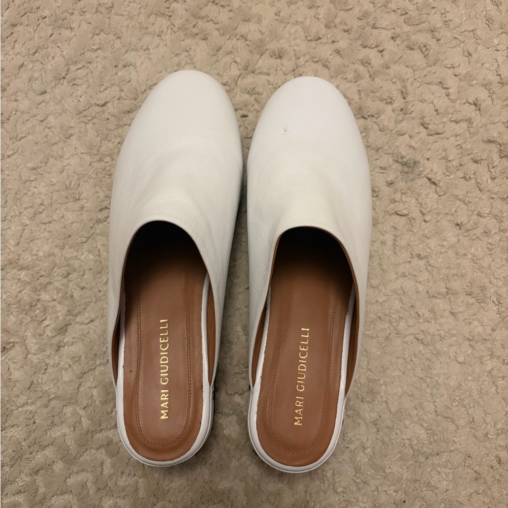 White leather clogs